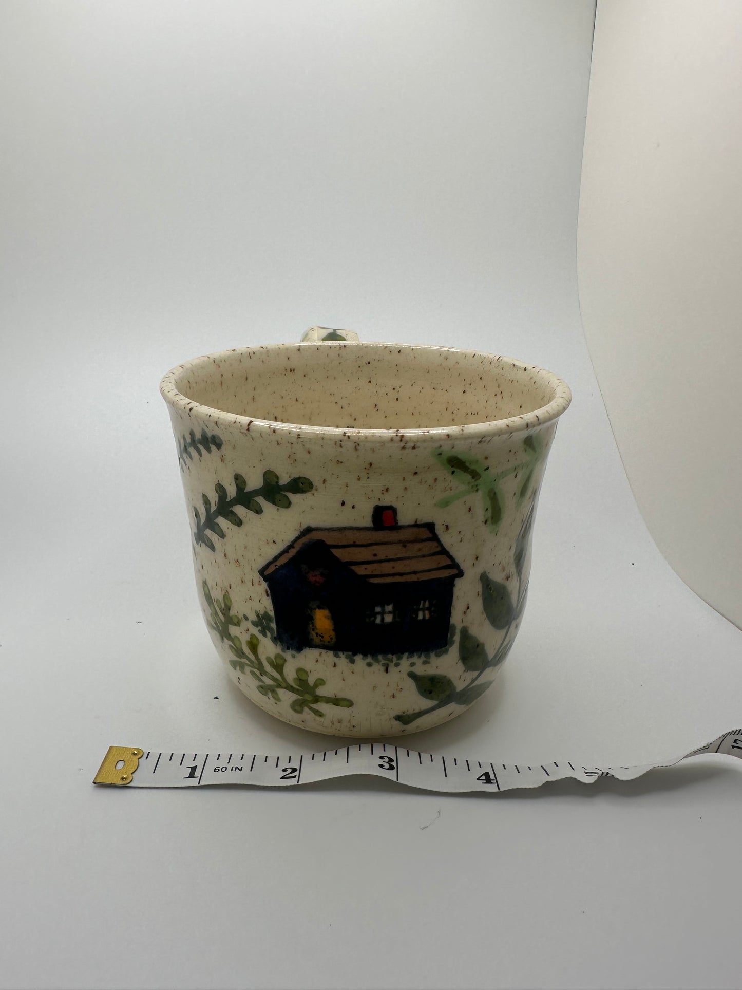 Little house with leaves mug